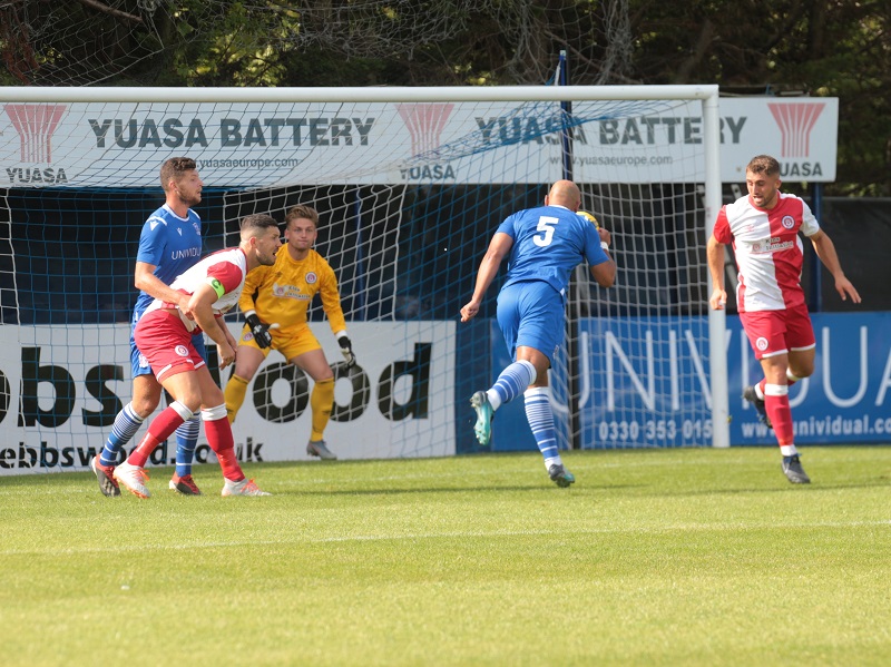 New signing Simon Downer heads just wide