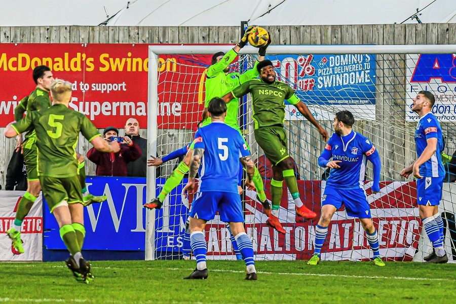 Martin Horsell collects the ball under pressure