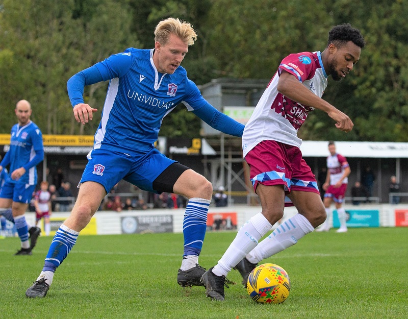 Joe Shepherd closes down the Chesham player