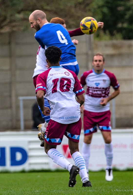 Jamie Edge gets the highest to win the ball