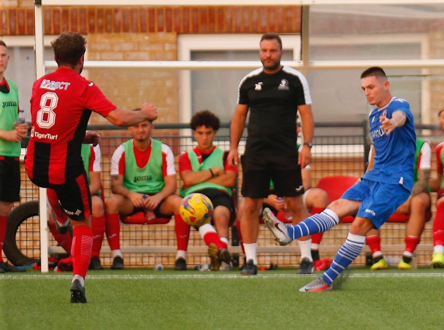 Rhys Wells crosses the ball