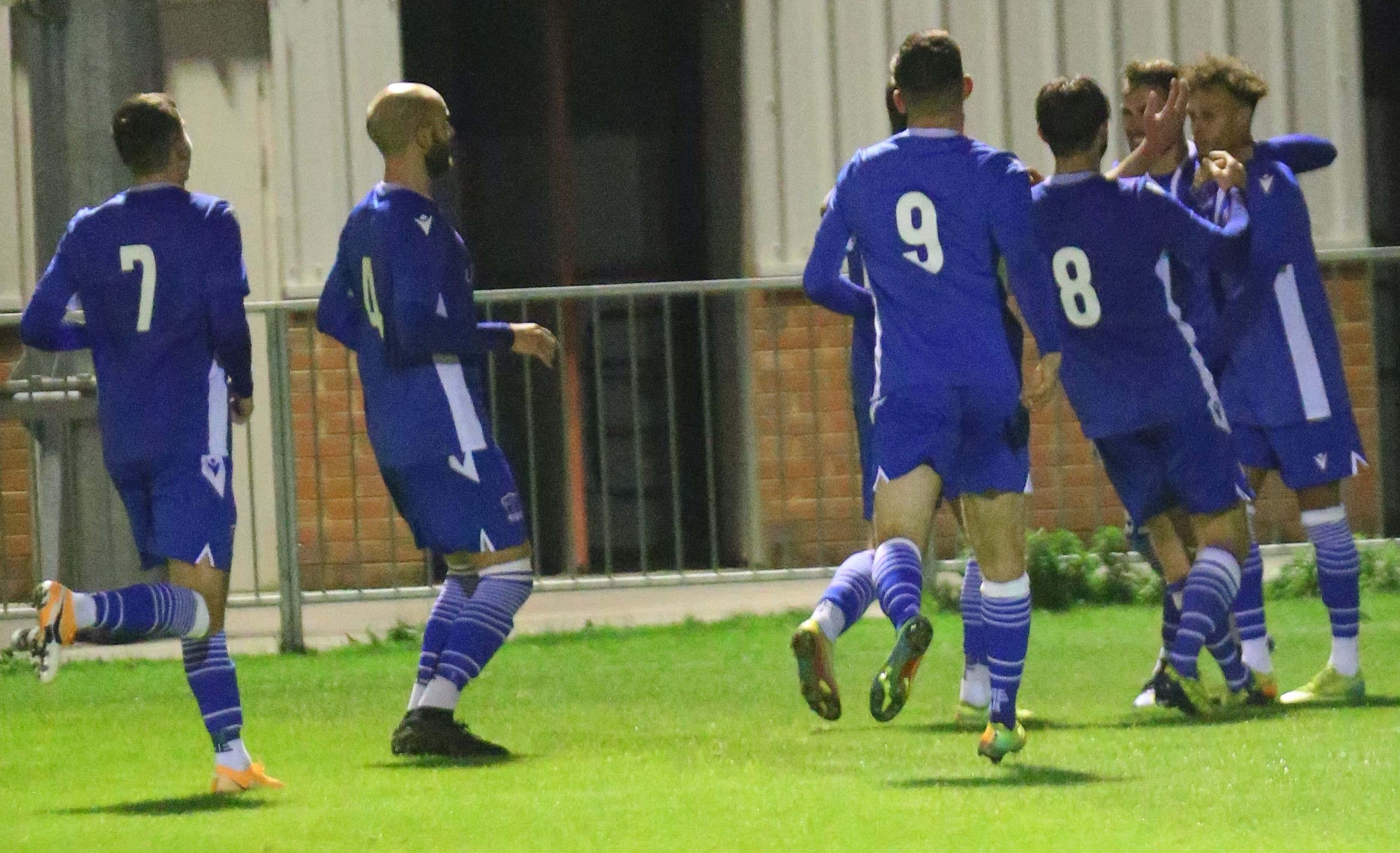 The players celebrate Campbells equaliser