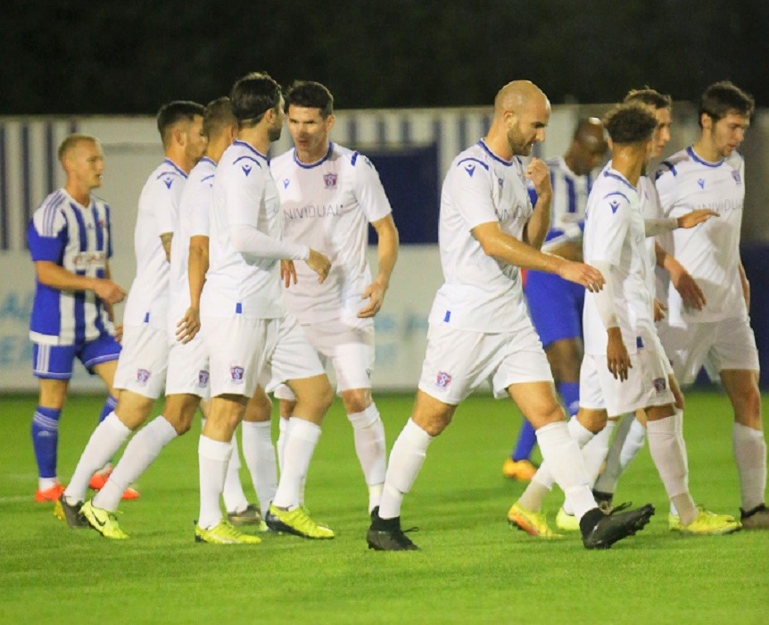 Marshall is congratulated on his goal