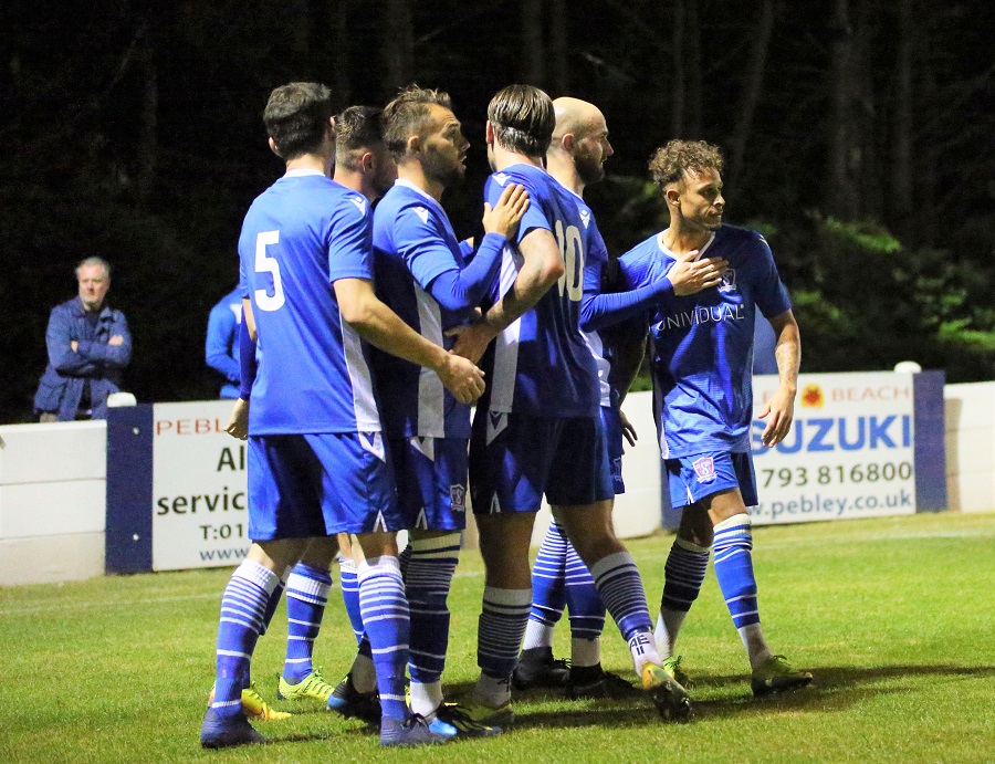 Ryan celebrates the well worked goal with his teammates