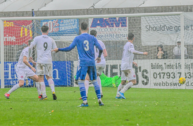 Michael Hopkins free kick is well saved by Truro keeper James Hamon