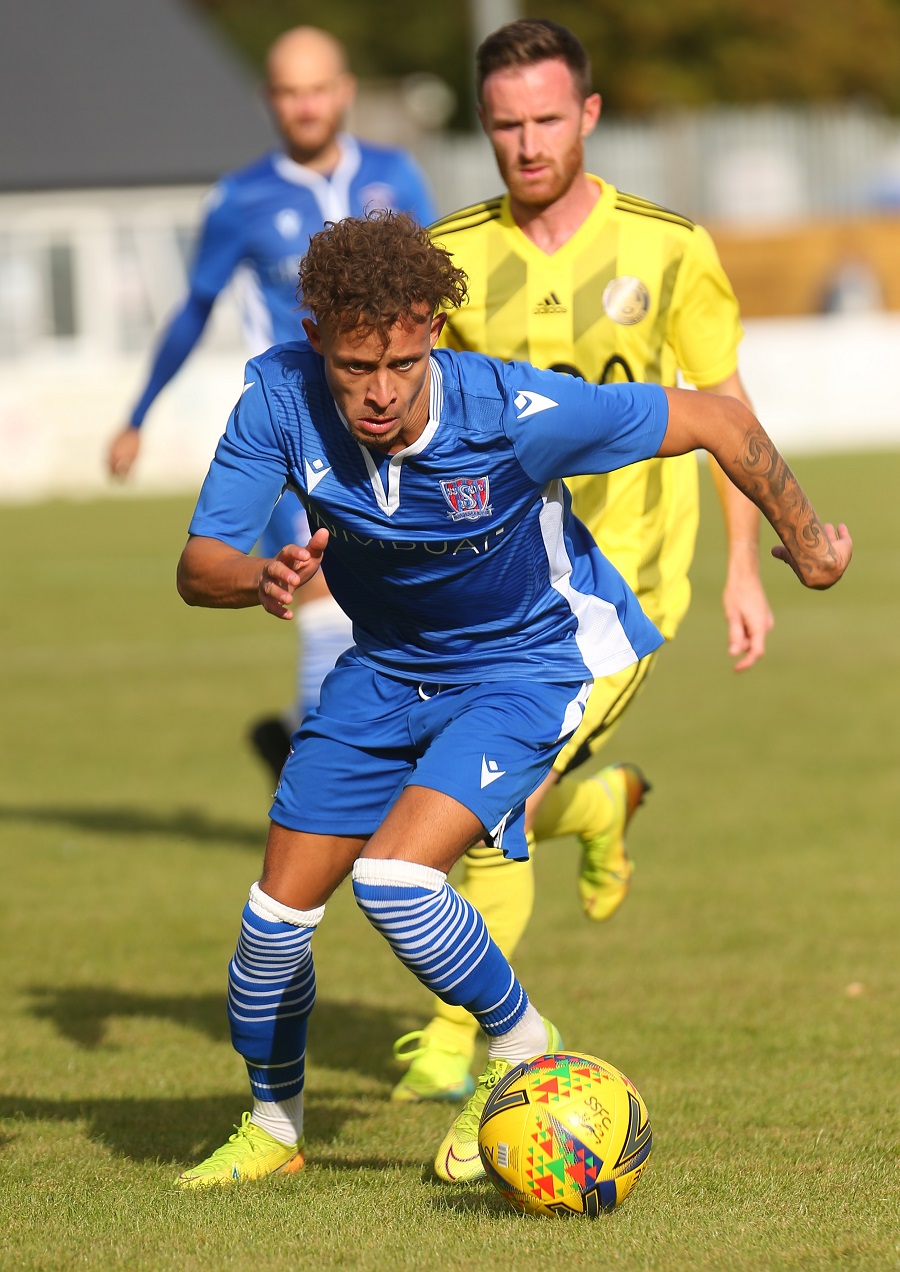 Goalscorer Ryan Campbell gets away from his marker