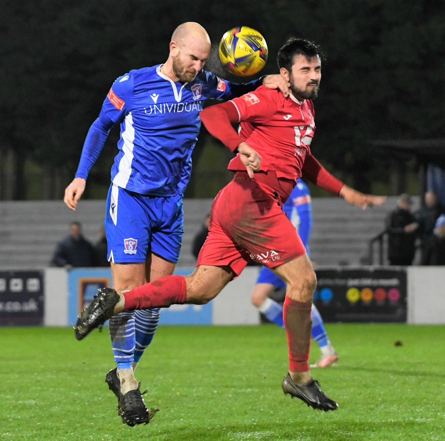 Jamie Edge challenges Highworth’s Felipe Barcelos